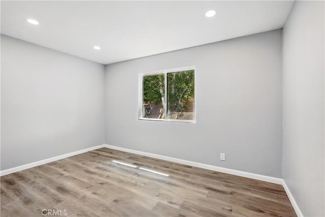 43820 Beech Ave, Lancaster, CA 93534 - spare room with baseboards, wood finished floors, and recessed lighting