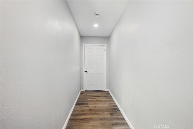 43820 Beech Ave, Lancaster, CA 93534 - hall with baseboards, wood finished floors, and recessed lighting