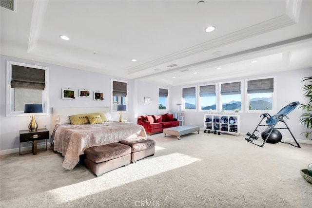carpeted bedroom with a raised ceiling, recessed lighting, baseboards, and crown molding