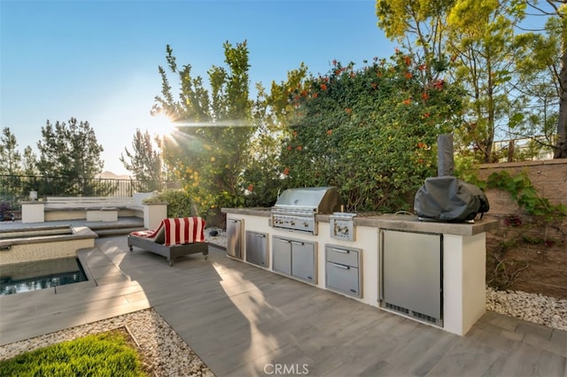 view of patio / terrace with area for grilling