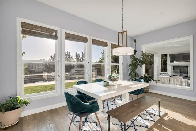 sunroom / solarium featuring healthy amount of natural light