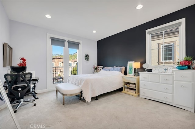 bedroom with access to outside, light colored carpet, recessed lighting, and baseboards