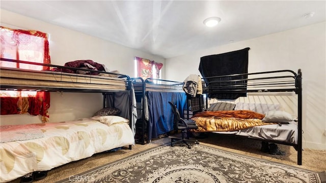 bedroom featuring carpet
