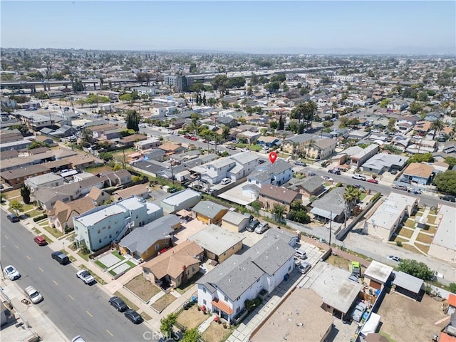 aerial overview of property's location with nearby suburban area