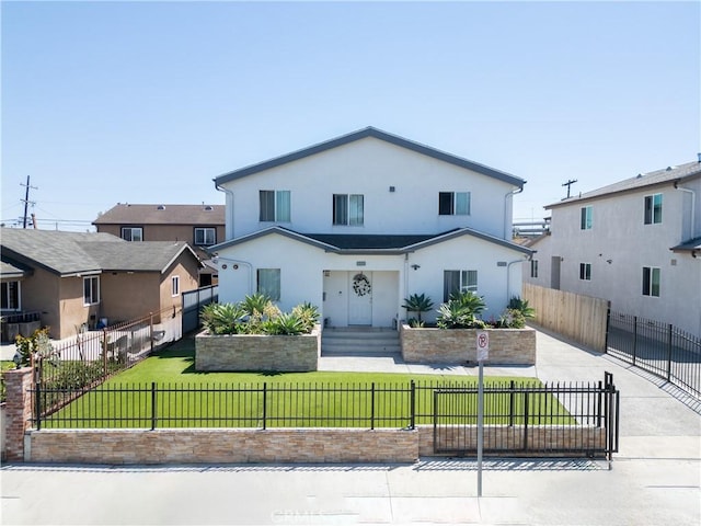 view of front of home featuring stucco siding