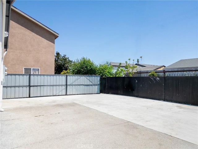 view of patio / terrace with fence