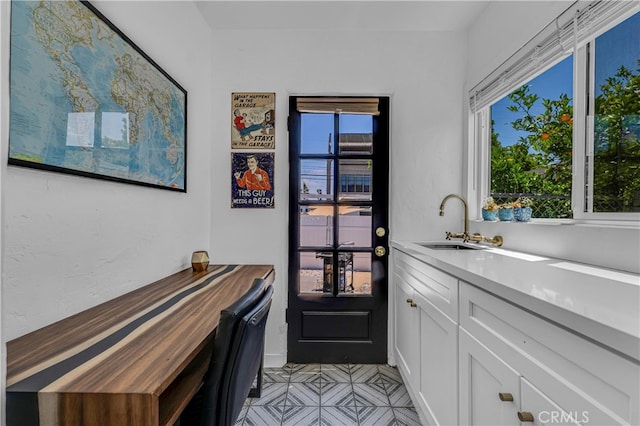 doorway featuring a sink