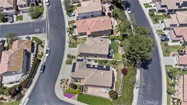 aerial view of property's location with nearby suburban area
