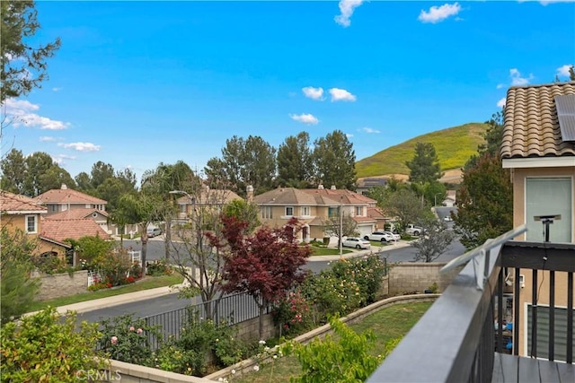 view of mountain backdrop with nearby suburban area