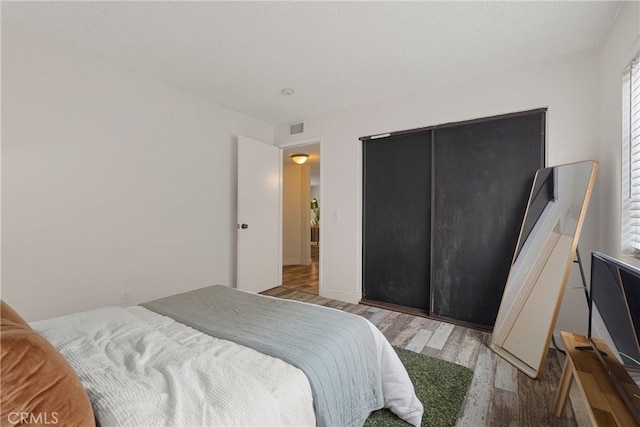 645 Pacific Ave Unit 304, Long Beach, CA 90802 - bedroom with wood finished floors