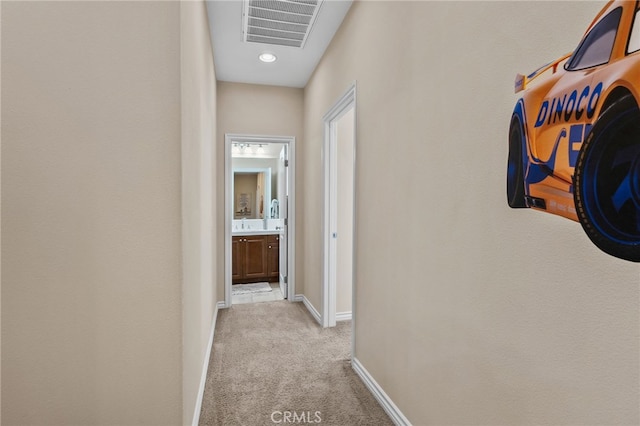 14538 Eagle River Rd, Eastvale, CA 92880 - corridor with light carpet and baseboards
