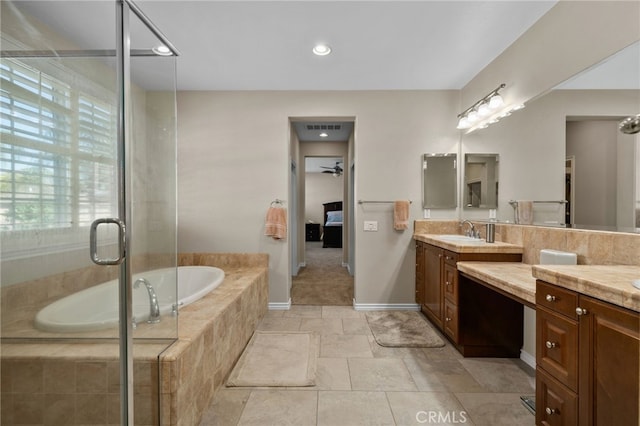 14538 Eagle River Rd, Eastvale, CA 92880 - ensuite bathroom featuring a garden tub, vanity, a stall shower, ceiling fan, and recessed lighting