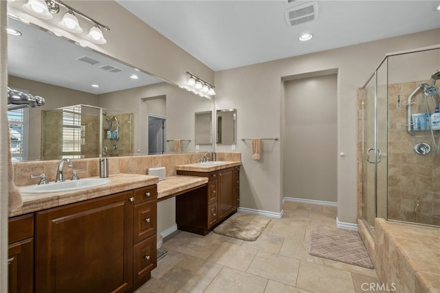 14538 Eagle River Rd, Eastvale, CA 92880 - bathroom with a stall shower, two vanities, and baseboards