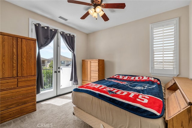 14538 Eagle River Rd, Eastvale, CA 92880 - carpeted bedroom featuring access to outside, multiple windows, and french doors