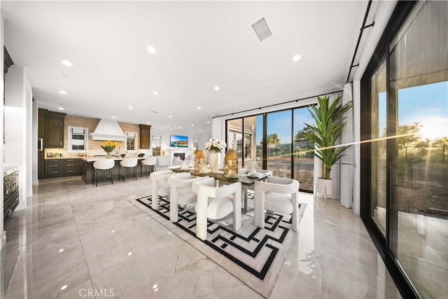 100 Headwaters, Irvine, CA 92602 - dining room featuring recessed lighting, light marble finish floors, and expansive windows