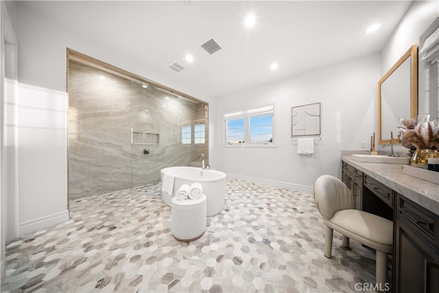 100 Headwaters, Irvine, CA 92602 - bathroom featuring walk in shower, a freestanding bath, baseboards, recessed lighting, and vanity