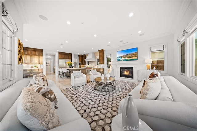 100 Headwaters, Irvine, CA 92602 - living area with recessed lighting, a glass covered fireplace, and crown molding