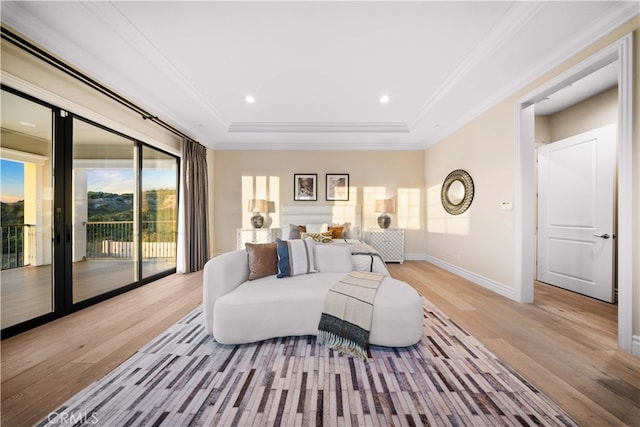 100 Headwaters, Irvine, CA 92602 - bedroom featuring access to exterior, light wood-style flooring, a tray ceiling, baseboards, and crown molding