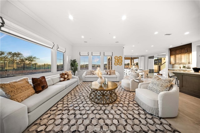 100 Headwaters, Irvine, CA 92602 - living area featuring crown molding, recessed lighting, and stairs