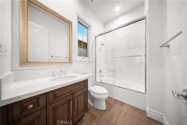 100 Headwaters, Irvine, CA 92602 - bathroom featuring wood finished floors, toilet, vanity, and combined bath / shower with glass door