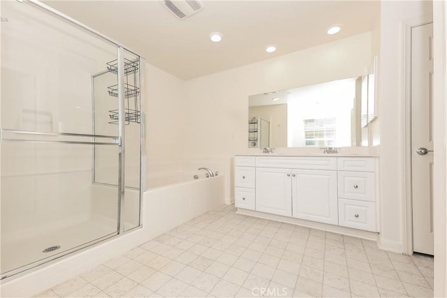 7460 Jersey St, Chino, CA 91708 - bathroom featuring vanity, a garden tub, a stall shower, and recessed lighting