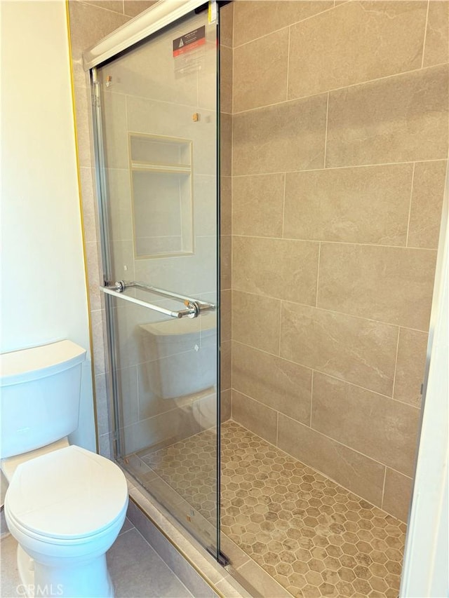 2844 E 3rd St Unit 210, Long Beach, CA 90814 - full bath with a stall shower, toilet, and tile patterned floors