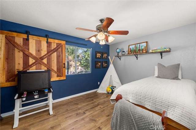 7189 Myrtle Pl, Fontana, CA 92336 - bedroom with hardwood / wood-style flooring, baseboards, and ceiling fan