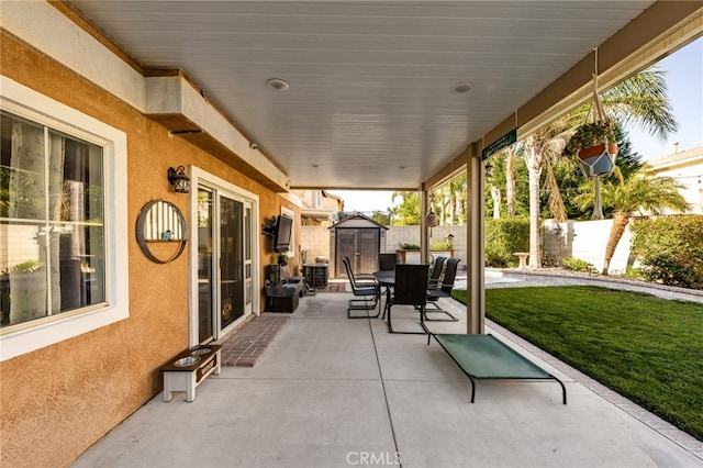7189 Myrtle Pl, Fontana, CA 92336 - view of patio featuring a storage shed, an outbuilding, and outdoor dining area
