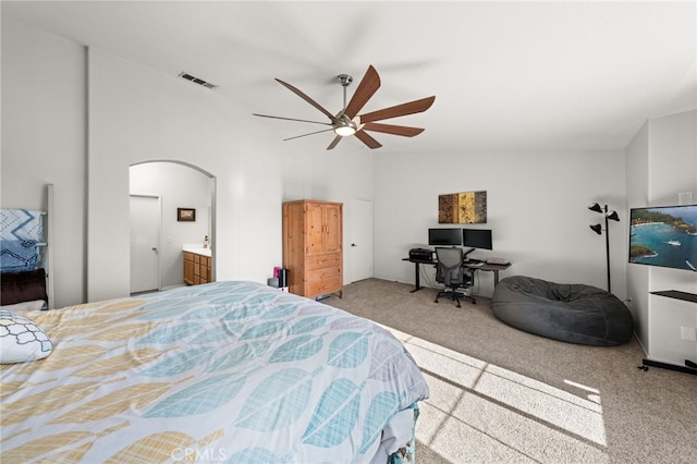 7189 Myrtle Pl, Fontana, CA 92336 - carpeted bedroom with arched walkways, ceiling fan, and vaulted ceiling