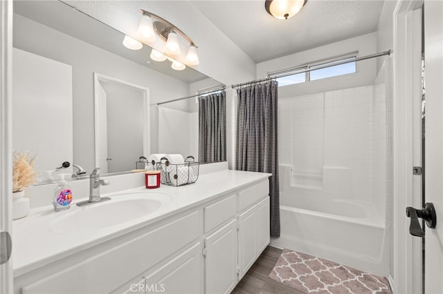 7189 Myrtle Pl, Fontana, CA 92336 - bathroom featuring shower / bathtub combination with curtain, vanity, and wood finished floors