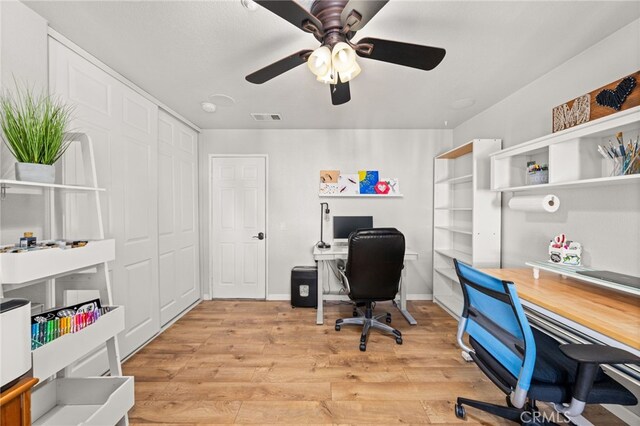 7189 Myrtle Pl, Fontana, CA 92336 - office area with light wood-style floors, ceiling fan, and baseboards