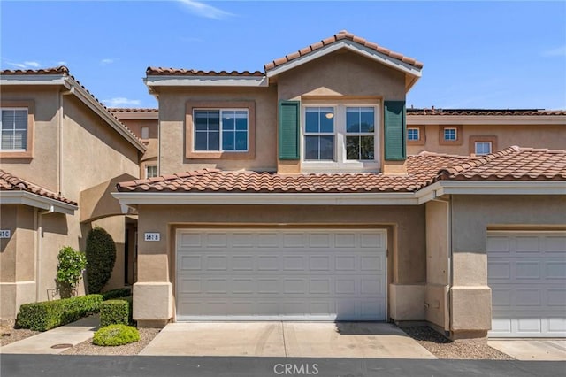587 Fenwick Way Unit B, Simi Valley, CA 93065 - view of front of property featuring a tile roof and stucco siding