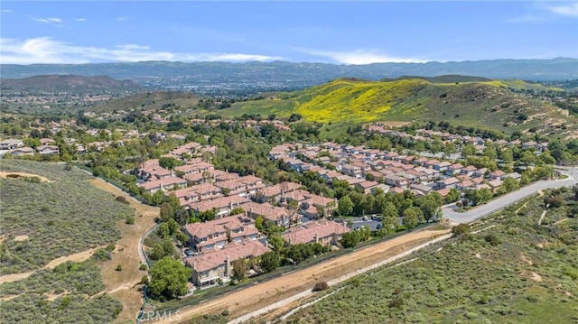 587 Fenwick Way Unit B, Simi Valley, CA 93065 - aerial view of property's location featuring nearby suburban area and a mountain backdrop