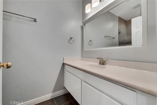 587 Fenwick Way Unit B, Simi Valley, CA 93065 - full bathroom with vanity, tile patterned floors, and baseboards