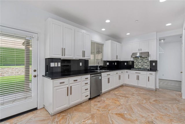 kitchen with stainless steel dishwasher, under cabinet range hood, a sink, white cabinetry, and recessed lighting