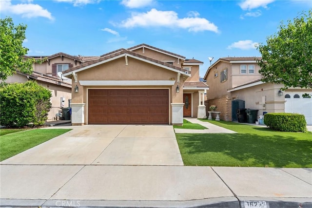 traditional-style home with stucco siding, an attached garage, a front lawn, and concrete driveway