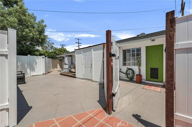 view of patio featuring fence
