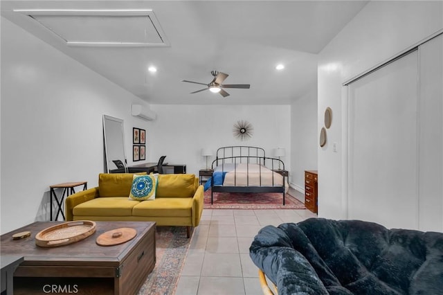 tiled living room with attic access, a wall mounted air conditioner, ceiling fan, and recessed lighting