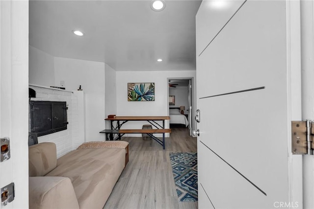 living area featuring recessed lighting and wood finished floors
