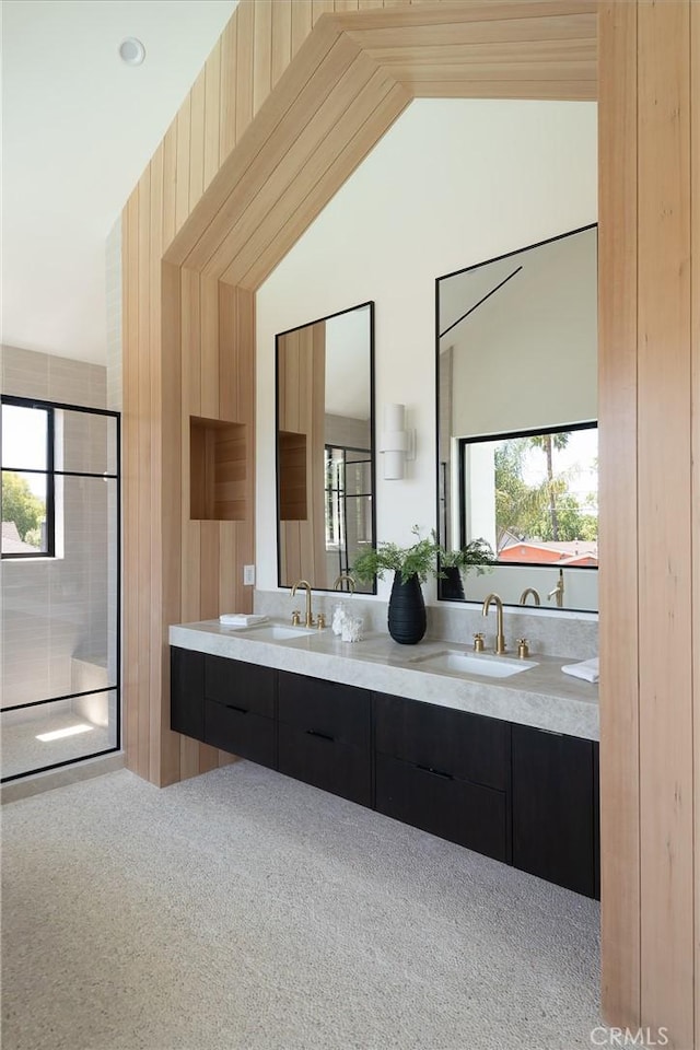 bathroom featuring double vanity