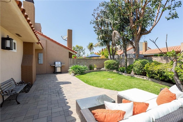 view of patio featuring an outdoor living space and grilling area