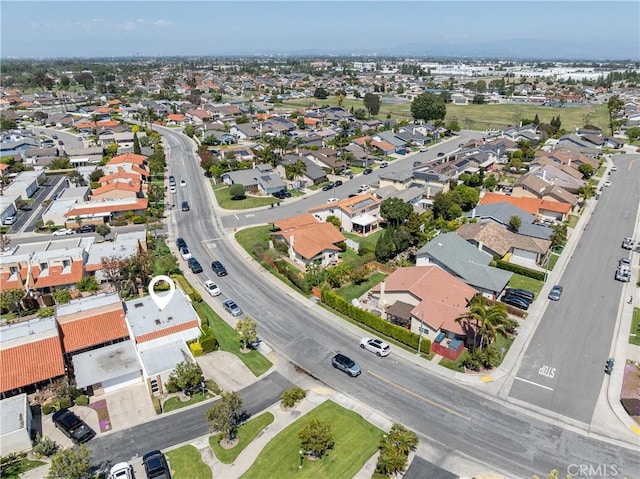 aerial overview of property's location with nearby suburban area