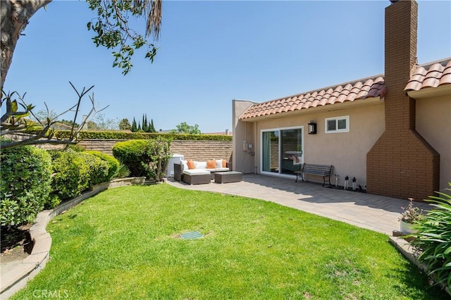 view of yard with a patio area and an outdoor living space
