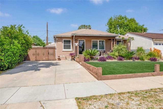 1821 N Niagara St, Burbank, CA 91505 - view of front of home featuring a gate and stucco siding