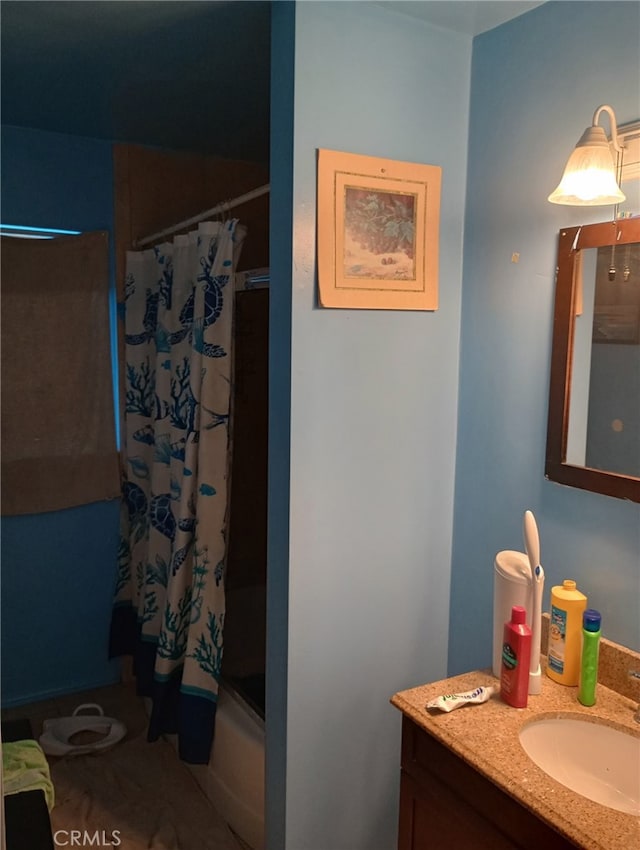full bathroom with vanity and shower / bath combination with curtain