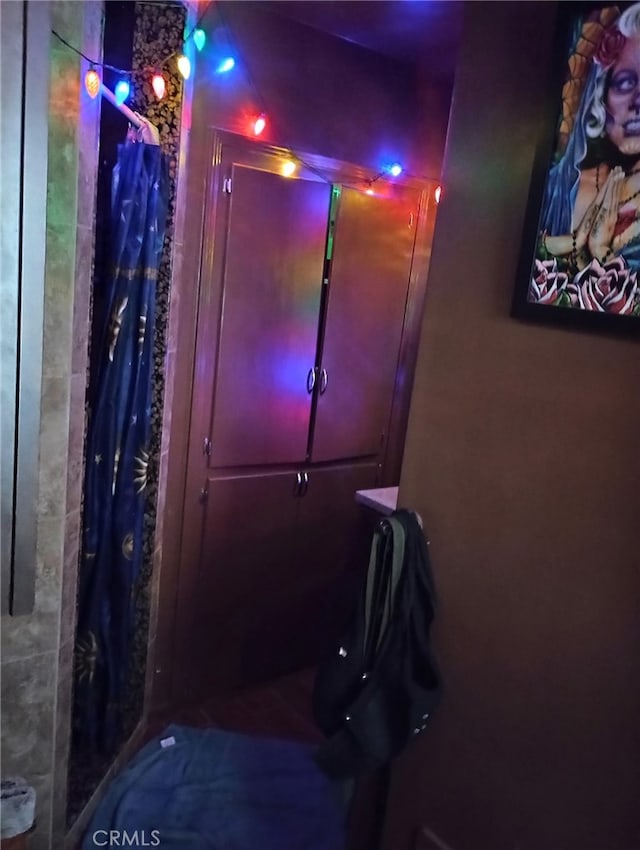 bathroom with a shower with shower curtain