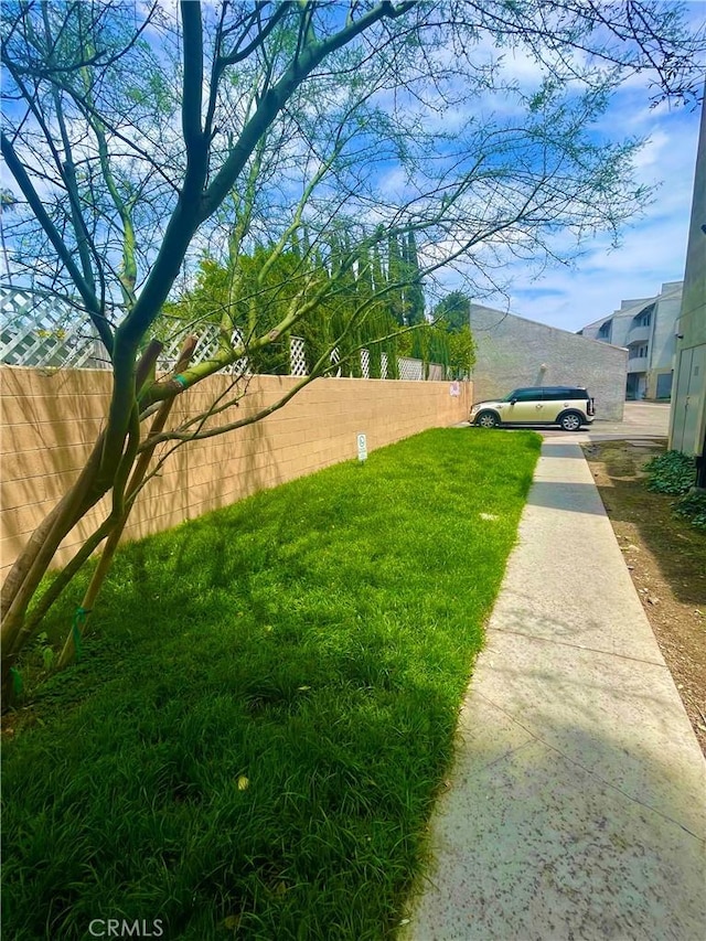 view of yard with fence