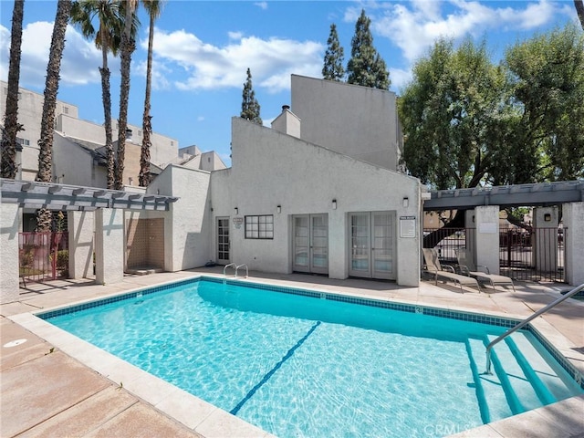 20155 Keswick St Unit 117, Winnetka, CA 91306 - community pool featuring french doors, a pergola, and a patio