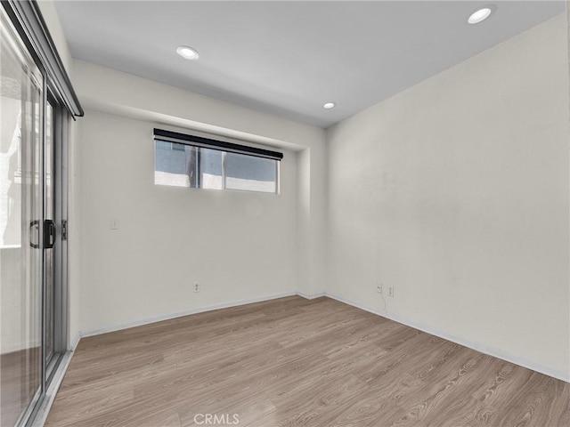 20155 Keswick St Unit 117, Winnetka, CA 91306 - spare room featuring light wood-type flooring and recessed lighting