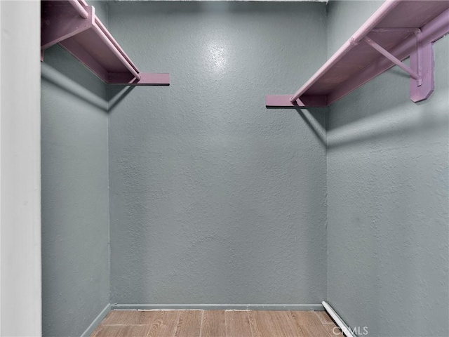 20155 Keswick St Unit 117, Winnetka, CA 91306 - spacious closet featuring wood finished floors